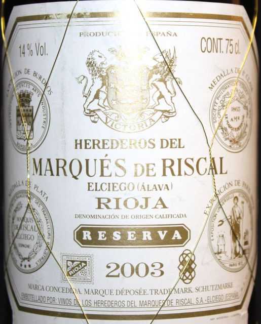 12 BOUTEILLES DE RIOJA HEREDEROS DEL MARQUES DE RISCAL RESERVA 2003. CAISSE CARTON.